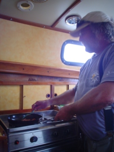 Michael doing double duty in the galley.